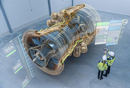 Two factory workers wearing augmented reality goggles working on a large motor (virtual reality).